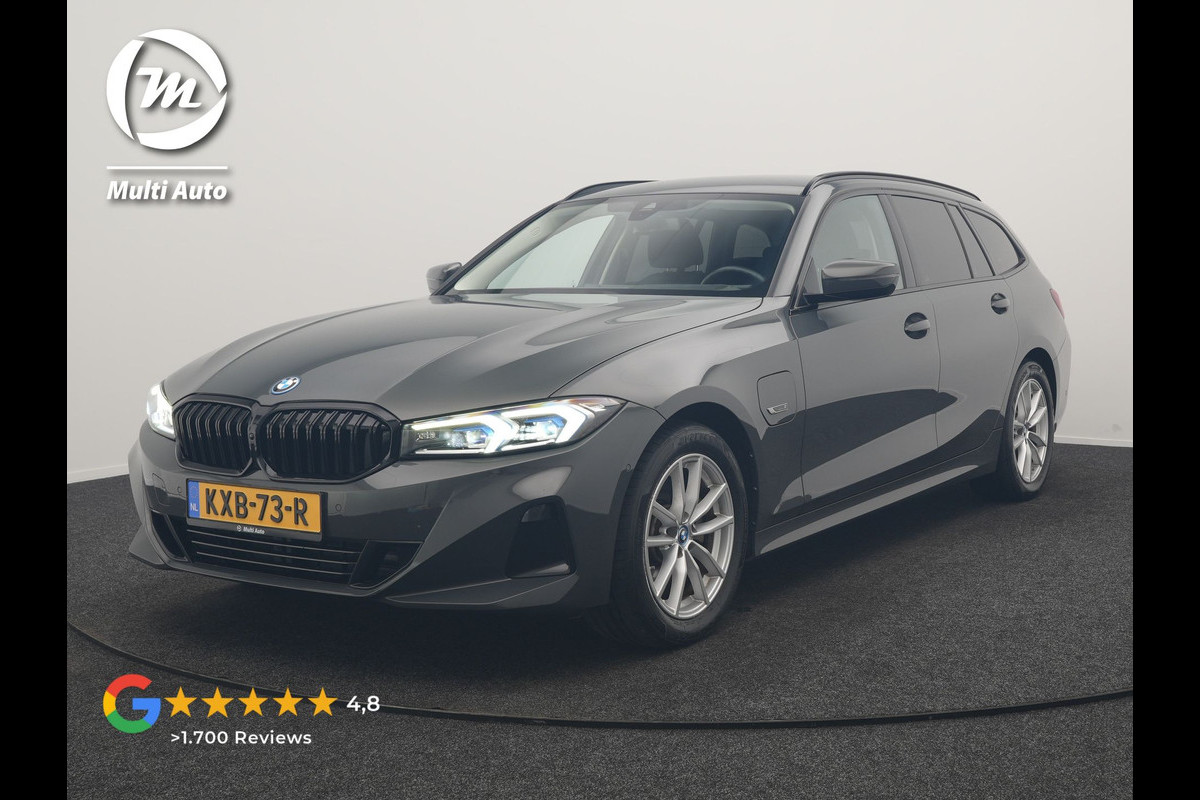 BMW 3 Serie Touring 320e Facelift 204pk PHEV Dealer O.H. | Dravitgrau metallic | Head Up | Camera | Widescreen Navi | Stoelverwarming | Apple Carplay | Blis | Adaptive LED | Park Assist | DAB | Plug In Hybrid |