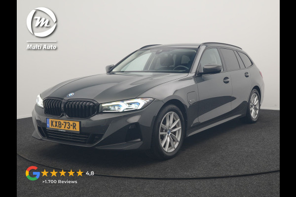 BMW 3 Serie Touring 320e Facelift 204pk PHEV Dealer O.H. | Dravitgrau metallic | Head Up | Camera | Widescreen Navi | Stoelverwarming | Apple Carplay | Blis | Adaptive LED | Park Assist | DAB | Plug In Hybrid |