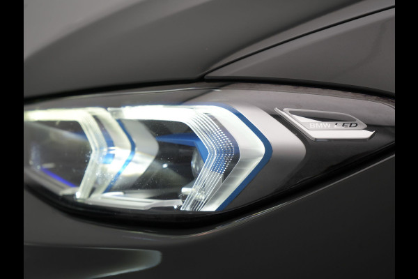BMW 3 Serie Touring 320e Facelift 204pk PHEV Dealer O.H. | Dravitgrau metallic | Head Up | Camera | Widescreen Navi | Stoelverwarming | Apple Carplay | Blis | Adaptive LED | Park Assist | DAB | Plug In Hybrid |