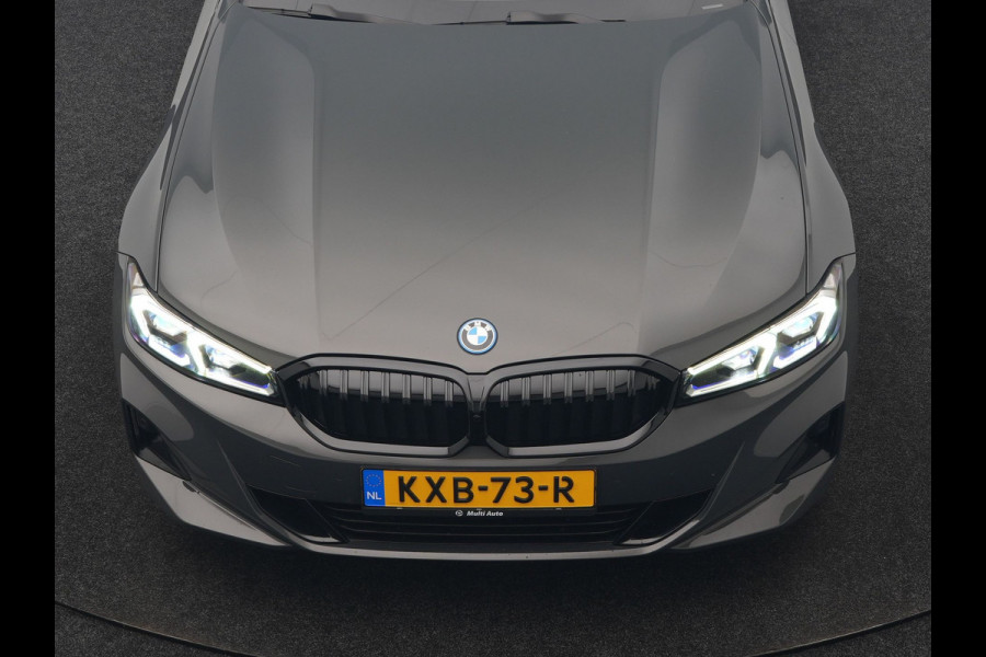BMW 3 Serie Touring 320e Facelift 204pk PHEV Dealer O.H. | Dravitgrau metallic | Head Up | Camera | Widescreen Navi | Stoelverwarming | Apple Carplay | Blis | Adaptive LED | Park Assist | DAB | Plug In Hybrid |