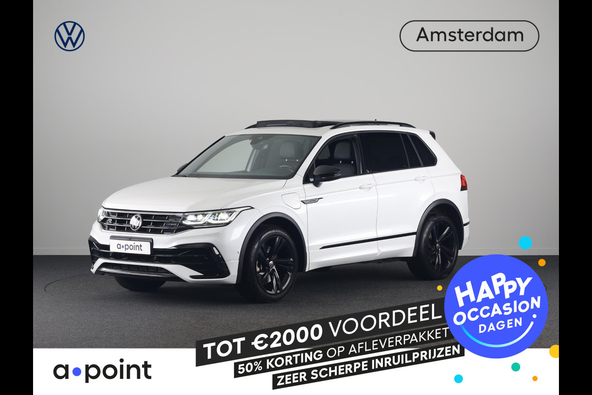 Volkswagen Tiguan 1.4 TSI eHybrid R-Line Business 245 pk Automaat (DSG) | Navigatie | Panoramadak | Parkeersensoren (Park assist) | Rondomzicht camera | Lederen bekleding | Elektr. voorstoelen met geheugen | Black Style pakket | R-Line |