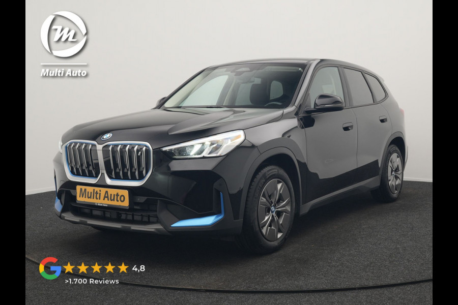 BMW iX1 xDrive30 67 kWh 313pk Dealer O.H. | Adaptief M Onderstel | Camera | Cruise Control | Stoelverwarming | Widescreen Navi | Park Assist | Apple Carplay | Navigatie | DAB | Standkachel |