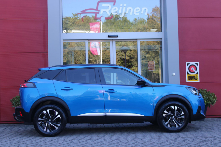 Peugeot 2008 1.2 130PK ALLURE PACK | TREKHAAK AFNEEMBAAR | NAVIGATIE 10" TOUCHSCREEN | APPLE CARPLAY/ANDROID AUTO | ACHTERUITRIJ CAMERA | 3-D INSTRUMENTENPANEEL | CLIMATE CONTROL | CRUISE CONTROL | KEYLESS ENTRY / START | 17" LICHTMETALEN VELGEN |