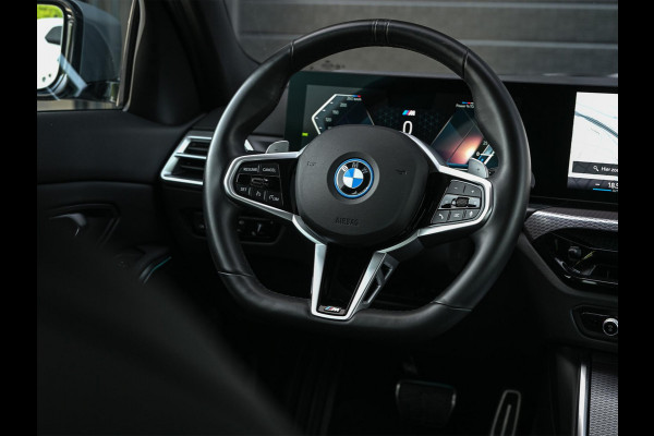 BMW 3-serie 330e | M-Sport | NL auto | Facelift | Stoelverwarming | Camera | Ambiance Interieur | Shadowline | Led Koplampen |