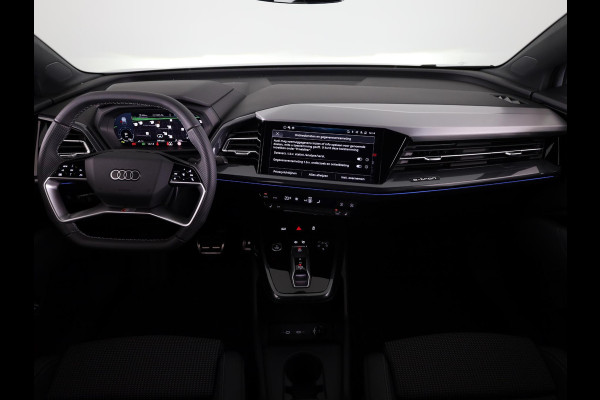 Audi Q4 e-tron 45 S edition Competition e-tron 82 kWh 286 pk | Navigatie | Stoelverwarming | Assistentiepakket plus | Comfortpakket | Ambient lichtpakket | Optiekpakket zwart plus | 20 inch Lichtmetalen velgen