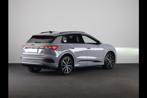 Audi Q4 e-tron 45 S edition Competition e-tron 82 kWh 286 pk | Navigatie | Stoelverwarming | Assistentiepakket plus | Comfortpakket | Ambient lichtpakket | Optiekpakket zwart plus | 20 inch Lichtmetalen velgen