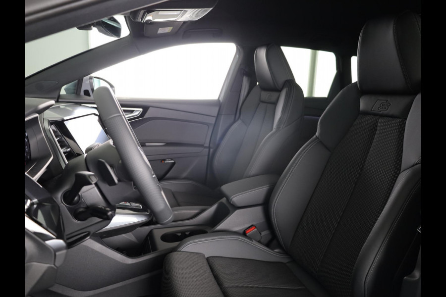 Audi Q4 e-tron 45 S edition Competition e-tron 82 kWh 286 pk | Navigatie | Stoelverwarming | Assistentiepakket plus | Comfortpakket | Ambient lichtpakket | Optiekpakket zwart plus | 20 inch Lichtmetalen velgen