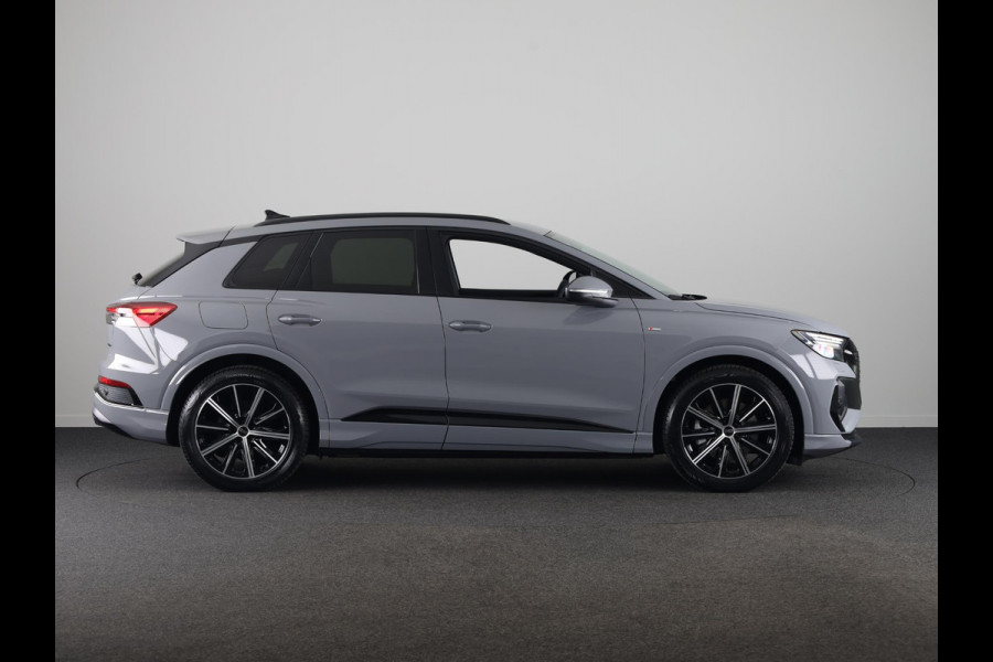 Audi Q4 e-tron 45 S edition Competition e-tron 82 kWh 286 pk | Navigatie | Stoelverwarming | Assistentiepakket plus | Comfortpakket | Ambient lichtpakket | Optiekpakket zwart plus | 20 inch Lichtmetalen velgen