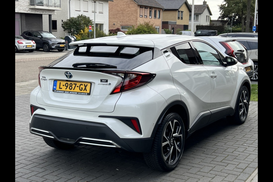 Toyota C-HR 2.0 Hybrid Style | Parelmoer wit, Dodehoekherkenning, Stoel + Stuurverwarming, Parkeersensoren, CarPlay, Navigatie