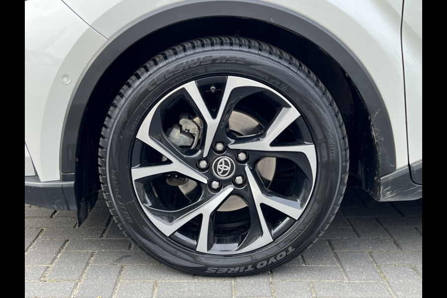 Toyota C-HR 2.0 Hybrid Style | Parelmoer wit, Dodehoekherkenning, Stoel + Stuurverwarming, Parkeersensoren, CarPlay, Navigatie