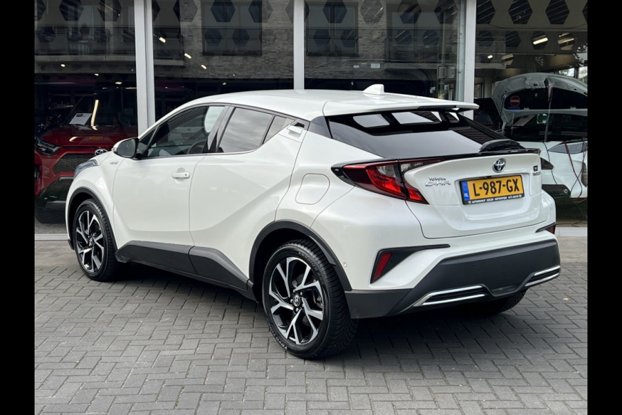 Toyota C-HR 2.0 Hybrid Style | Parelmoer wit, Dodehoekherkenning, Stoel + Stuurverwarming, Parkeersensoren, CarPlay, Navigatie