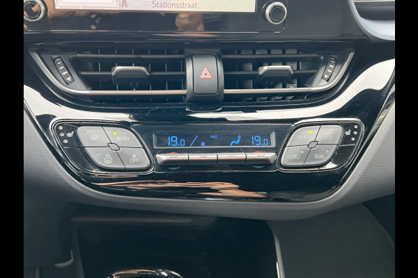 Toyota C-HR 2.0 Hybrid Style | Parelmoer wit, Dodehoekherkenning, Stoel + Stuurverwarming, Parkeersensoren, CarPlay, Navigatie