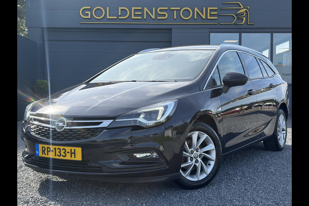 Opel Astra Sports Tourer 1.4 Business Executive ✓2 Eigenaar✓Camera✓Navi✓Trekhaakt✓Carplay✓Stoelverw✓Stuurverw✓Automaat✓Dealer Onderhouden✓Keyless✓Clima✓Cruise✓Pdc V+A✓Halfleder✓Comfortstoelen✓150pk✓Rijstrooksensor✓Dodehoeksensor✓Elekt Stoelen✓Lm velgen✓N.A.P✓Apk tot 03-2027