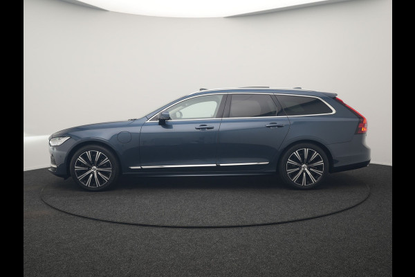 Volvo V90 T8 AWD Ultimate Bright LONG RANGE PHEV 350pk | Trekhaak Af Fabriek | Panodak | Adaptive Cruise | 360 Camera | Head Up | Lederen Sportstoelen Memory & Massage & Ventilatie | Bowers & Wilkins | Blis | Keyless | Stuur & Stoelen Verwarmd | Plug In Hybrid |