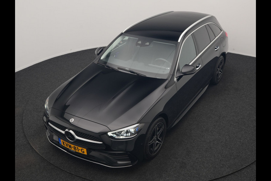 Mercedes-Benz C-Klasse Estate 300 e AMG Line PHEV 313pk Dealer O.H | Trekhaak Af Fabriek | Adaptive Cruise | Camera | Digital Light | Alcantara Sportstoelen Memory & Verwarmd | Keyless | Sfeerverlichting | Apple Carplay | Blis | DAB | 18"L.M | Plug In Hybrid