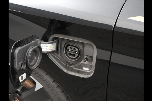 CUPRA Leon Sportstourer 1.4 e-Hybrid VZ 245 pk DSG Wegklapbare trekhaak Navigatie Apple CarPlay Android Auto Camera Parkeerhulp  Adaptive Cruise Control Dodehoekdetectie Stoel- en stuurverwarming Full Led Climate Control Lichtmetalen velgen