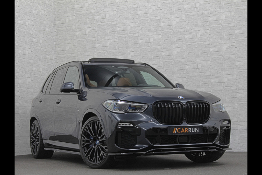 BMW X5 45e M-Performance Seats | 360 View | Panorama | ACC | Kristal pook | Head-Up | Laser-LED | Memory | Harman-Kardon | Keyless-Go | Trekhaak | Drive Assist Pro. | Leder | 4-Zone Clima | Standkachel | Rijklaarprijs & Bovag garantie | Carplay | Draadloos Laden | DAB | Sfeerverlichting |