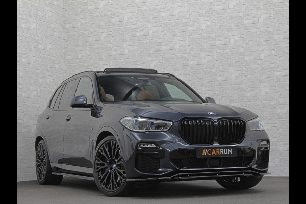 BMW X5 45e M-Performance Seats | 360 View | Panorama | ACC | Kristal pook | Head-Up | Laser-LED | Memory | Harman-Kardon | Keyless-Go | Trekhaak | Drive Assist Pro. | Leder | 4-Zone Clima | Standkachel | Rijklaarprijs & Bovag garantie | Carplay | Draadloos Laden | DAB | Sfeerverlichting |