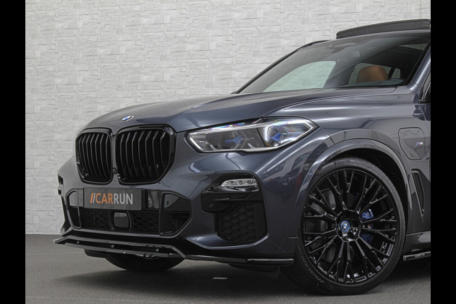 BMW X5 45e M-Performance Seats | 360 View | Panorama | ACC | Kristal pook | Head-Up | Laser-LED | Memory | Harman-Kardon | Keyless-Go | Trekhaak | Drive Assist Pro. | Leder | 4-Zone Clima | Standkachel | Rijklaarprijs & Bovag garantie | Carplay | Draadloos Laden | DAB | Sfeerverlichting |