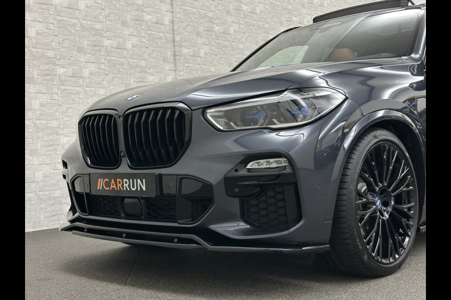 BMW X5 45e M-Performance Seats | 360 View | Panorama | ACC | Kristal pook | Head-Up | Laser-LED | Memory | Harman-Kardon | Keyless-Go | Trekhaak | Drive Assist Pro. | Leder | 4-Zone Clima | Standkachel | Rijklaarprijs & Bovag garantie | Carplay | Draadloos Laden | DAB | Sfeerverlichting |