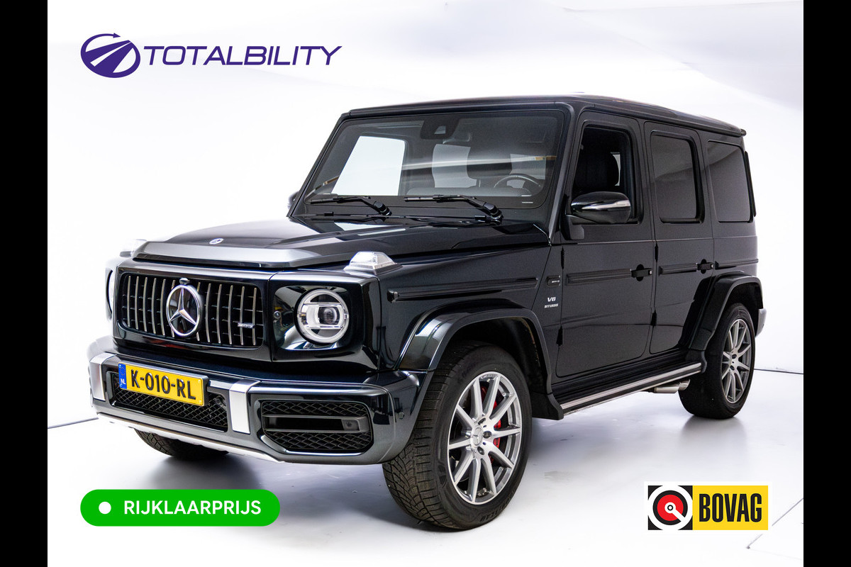 Mercedes-Benz G-Klasse 63 AMG Prem.Plus | Elek. schuif-/kanteldak | Burmester High end | Stoelverw. & koeling | Memory stoelen | Adap. cruise | Trekhaak, Treeplanken, Alcantara hemel, 360 Camera, Massagestoelen, NL auto, Volledig dealer onderhouden.