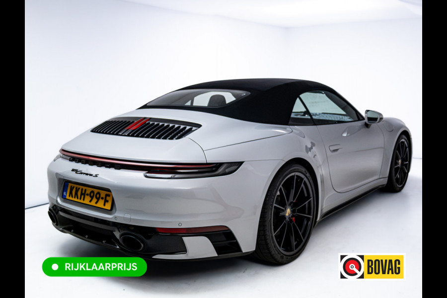 Porsche 911 Cabrio 3.0 Carrera S 451 PK | Sportdesign zwart | Sportuitlaat | Sport Chrono | Stoel verw. & ventilatie | Porsche approved gara Stuurbekr. plus, PASM, PTV Plus, Kl. 3 & 5 alarm, Sportstoelen plus, Ambienteverl., Leer pakket, Ijsgrijs metallic