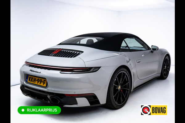 Porsche 911 Cabrio 3.0 Carrera S 451 PK | Sportdesign zwart | Sportuitlaat | Sport Chrono | Stoel verw. & ventilatie | Porsche approved gara Stuurbekr. plus, PASM, PTV Plus, Kl. 3 & 5 alarm, Sportstoelen plus, Ambienteverl., Leer pakket, Ijsgrijs metallic