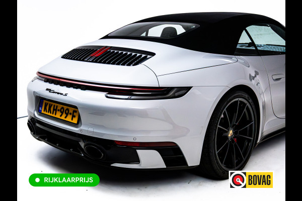 Porsche 911 Cabrio 3.0 Carrera S 451 PK | Sportdesign zwart | Sportuitlaat | Sport Chrono | Stoel verw. & ventilatie | Porsche approved gara Stuurbekr. plus, PASM, PTV Plus, Kl. 3 & 5 alarm, Sportstoelen plus, Ambienteverl., Leer pakket, Ijsgrijs metallic