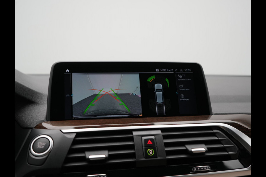 BMW X3 xDrive30e Advantage PHEV 293pk Dealer O.H | Trekhaak Af Fabriek | Head Up | Camera | Adaptief Onderstel | Cruise Control | Sportstoelen Verwarmd | Keyless | BLIS | Apple Carplay | Adaptive LED | Navigatie | Virtual | DAB | 18"L.M | Plug In Hybrid |
