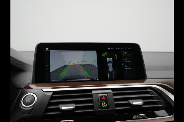 BMW X3 xDrive30e Advantage PHEV 293pk Dealer O.H | Trekhaak Af Fabriek | Head Up | Camera | Adaptief Onderstel | Cruise Control | Sportstoelen Verwarmd | Keyless | BLIS | Apple Carplay | Adaptive LED | Navigatie | Virtual | DAB | 18"L.M | Plug In Hybrid |