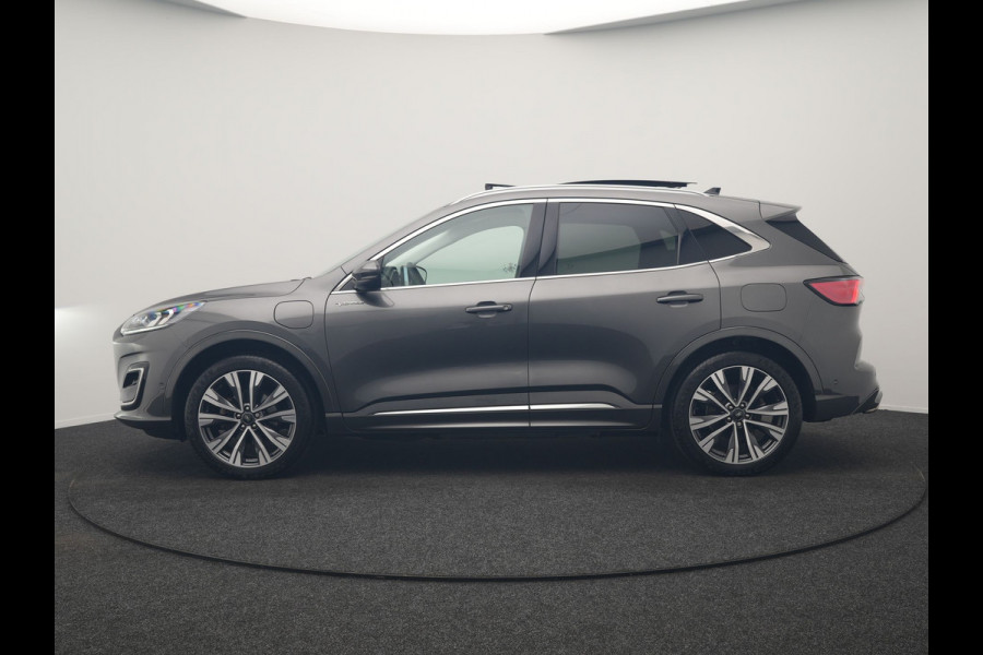 Ford Kuga 2.5 Vignale PHEV 225pk Dealer O.H. | Trekhaak Af Fabriek | Panodak | Adaptive Cruise | Head Up | 360 Camera | Bang & Olufsen | Lederen Comfortstoelen Memory & Verwarmd | Stuur Verwarmd | Apple Carplay | Blis | Keyless | DAB | Navigatie | 20"L.M | Plug In Hybrid |