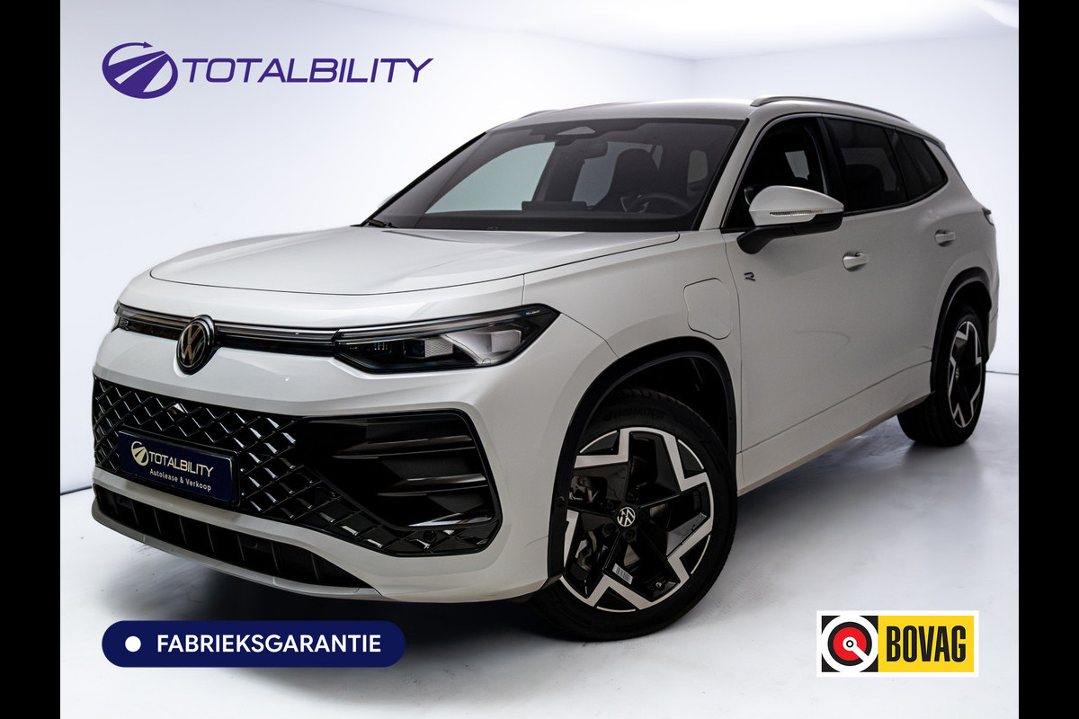 Volkswagen Tayron 1.5 eHybrid 204pk R-Line | DCC | HUD | Harman Kardon | IQ.Light | 360° | Massage | Oryx White parelmoer | Electrische Klep, Sfeerverlichting, incl. Winterwielenset