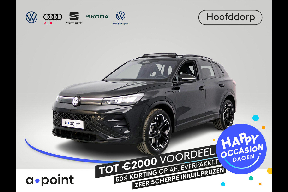 Volkswagen Tiguan 1.5 eHybrid R-Line Edition 272 pk Automaat (DSG) | Verlengde garantie | Navigatie | Panorama dak | Trekhaak (wegklapbaar) | Achteruitrijcamera (park assist) | Rondomzicht camera | Black-Style pakket | R-Line |