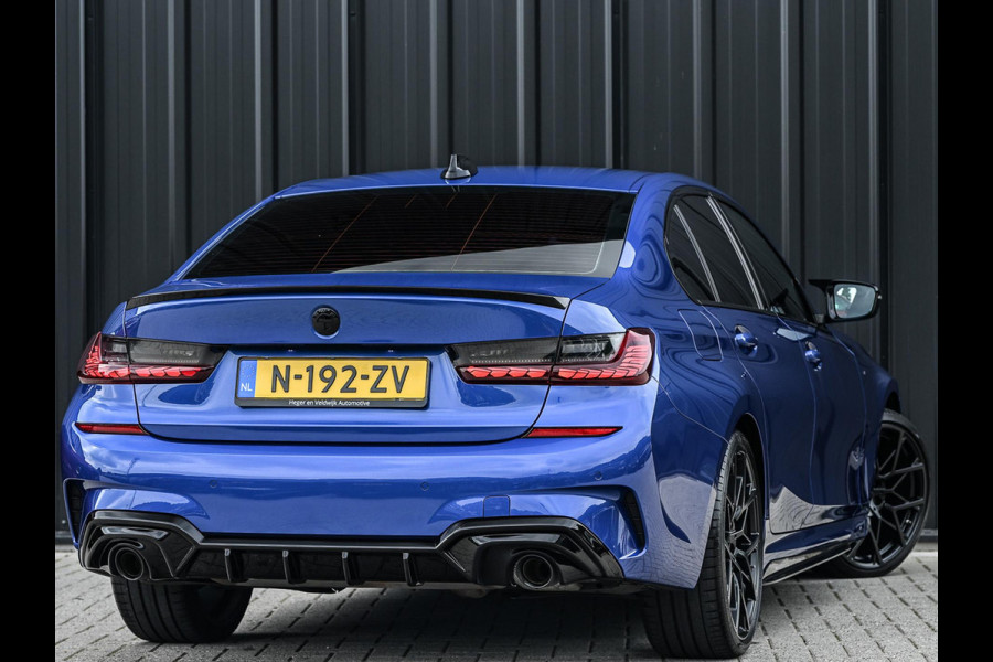 BMW 3 Serie 318i High Executive M-Sport | M-Performance | Stoelverwarming | Ambiance Interieur | PDC V+A | Cruise Control |
