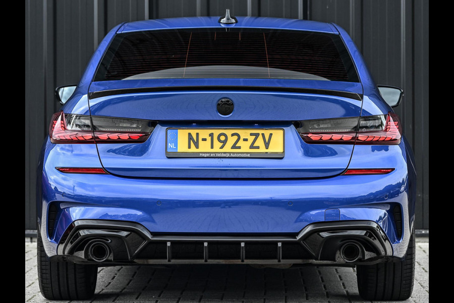 BMW 3 Serie 318i High Executive M-Sport | M-Performance | Stoelverwarming | Ambiance Interieur | PDC V+A | Cruise Control |