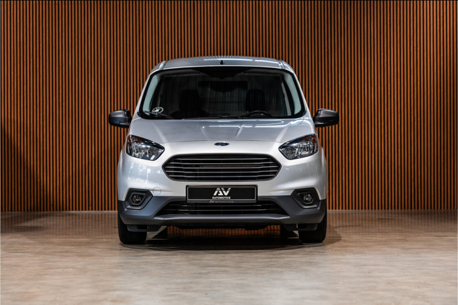 Ford Transit Courier 1.0 100 PK | Benzine | Navigatie | CarPlay | PDC | Stoelverwarming | Cruise control | MF Stuur | Airco | Nieuwe APK | Dealer onderhouden