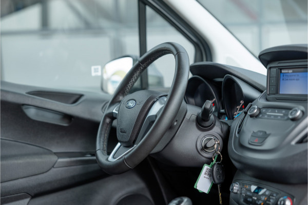 Ford Transit Courier 1.0 100 PK | Benzine | Navigatie | CarPlay | PDC | Stoelverwarming | Cruise control | MF Stuur | Airco | Nieuwe APK | Dealer onderhouden