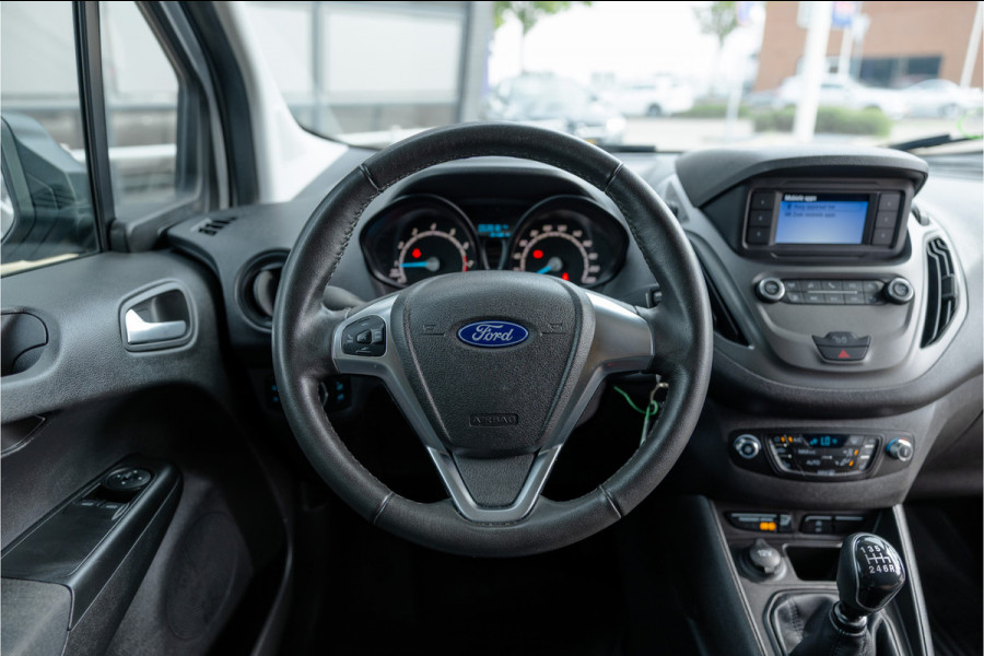 Ford Transit Courier 1.0 100 PK | Benzine | Navigatie | CarPlay | PDC | Stoelverwarming | Cruise control | MF Stuur | Airco | Nieuwe APK | Dealer onderhouden