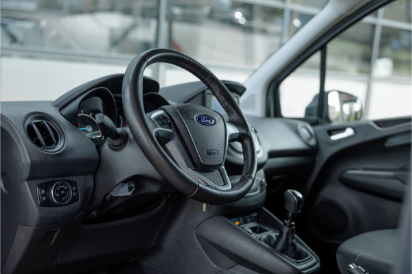 Ford Transit Courier 1.0 100 PK | Benzine | Navigatie | CarPlay | PDC | Stoelverwarming | Cruise control | MF Stuur | Airco | Nieuwe APK | Dealer onderhouden