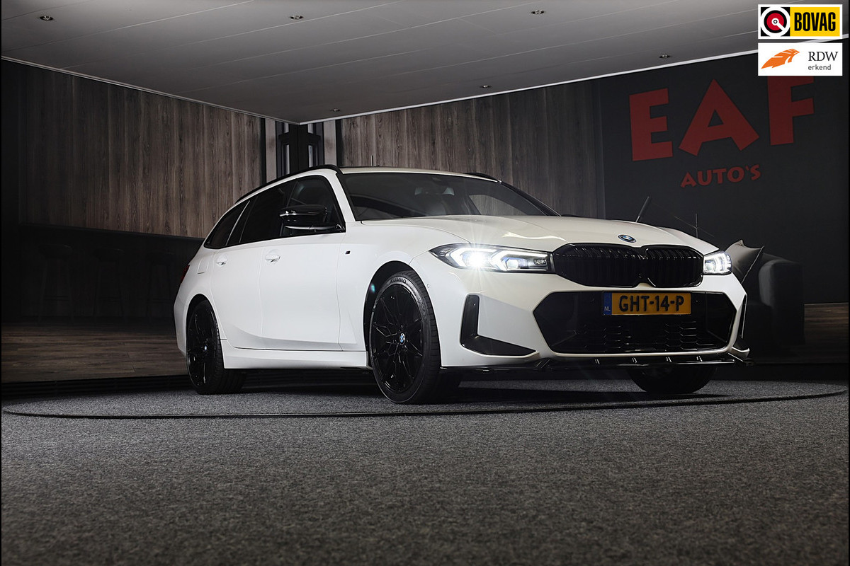 BMW 3 Serie Touring 320e M Line / Head Up / Memory / Navi / Camera / Acc / F1 / Open Panoramadak / Led / Pdc / 19 Inch