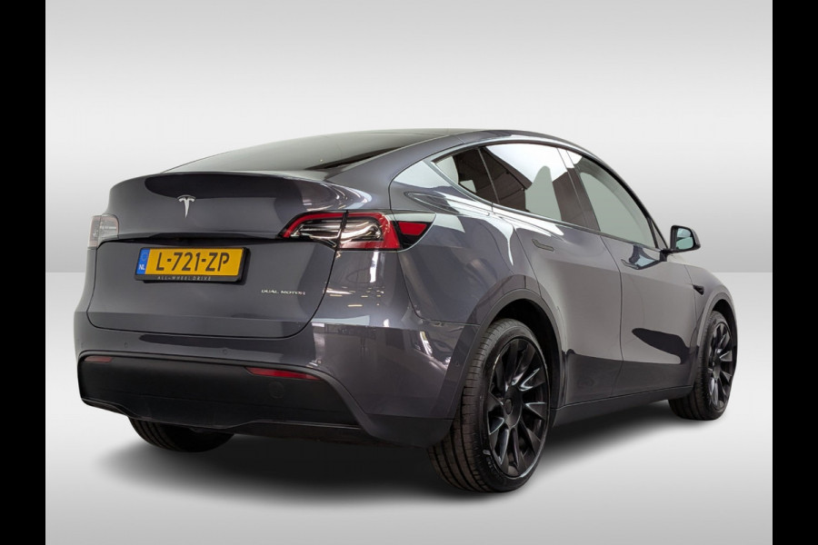 Tesla Model Y Long Range AWD 75 kWh / SoH 90,9% / Trekhaak / Autopilot / Panoramadak / Camera / 20'' / Keyless / Leder / Dodehoek / Navigatie / Stoelverwarming