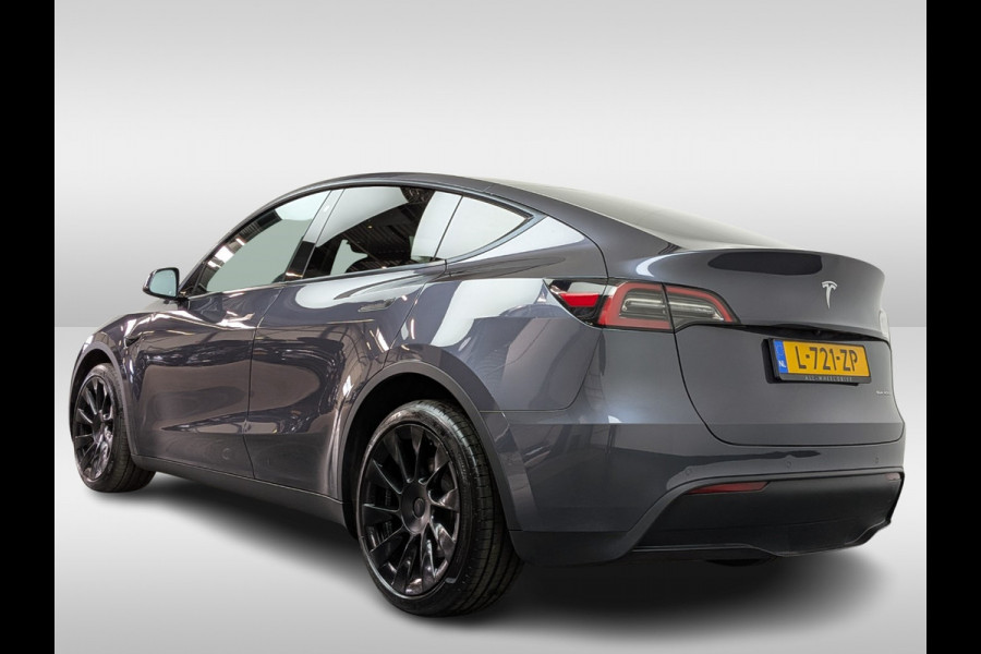 Tesla Model Y Long Range AWD 75 kWh / SoH 90,9% / Trekhaak / Autopilot / Panoramadak / Camera / 20'' / Keyless / Leder / Dodehoek / Navigatie / Stoelverwarming