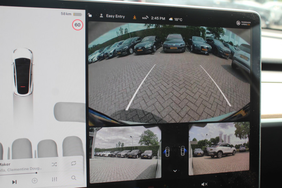 Tesla Model Y Long Range AWD 75 kWh / SoH 90,9% / Trekhaak / Autopilot / Panoramadak / Camera / 20'' / Keyless / Leder / Dodehoek / Navigatie / Stoelverwarming