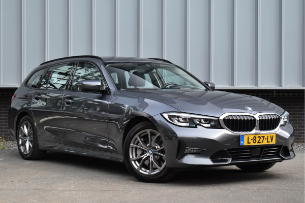 BMW 3 Serie Touring 330i High Executive Aut. | Sfeerverl | Stoelverwarming | Navi | Deal. OH