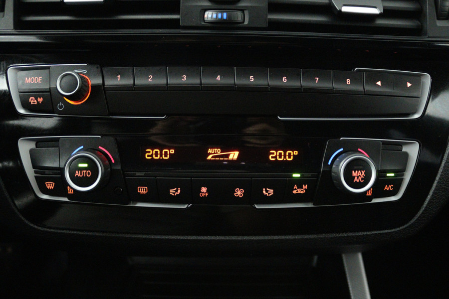 BMW 1-serie 118i Edition M Sport Shadow Executive (TREKHAAK, CRUISE CONTROL, NAVIGATIE, DEALER ONDERHOUDEN)