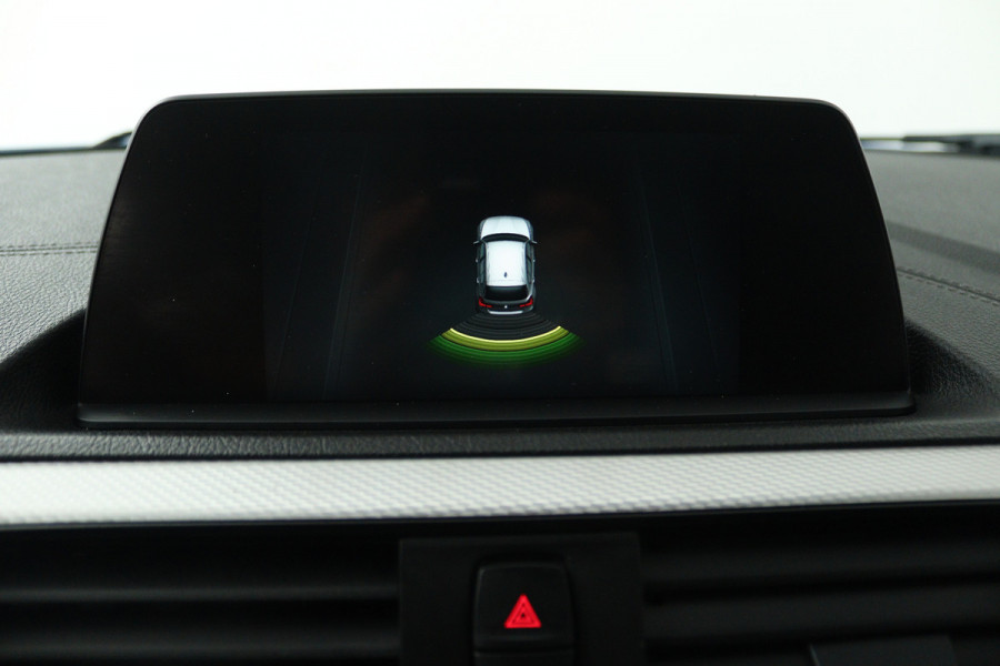 BMW 1-serie 118i Edition M Sport Shadow Executive (TREKHAAK, CRUISE CONTROL, NAVIGATIE, DEALER ONDERHOUDEN)
