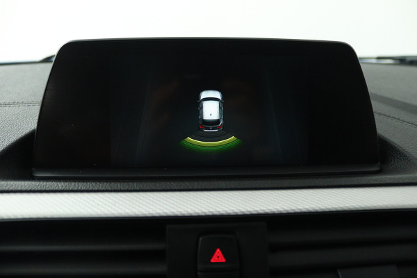 BMW 1-serie 118i Edition M Sport Shadow Executive (TREKHAAK, CRUISE CONTROL, NAVIGATIE, DEALER ONDERHOUDEN)