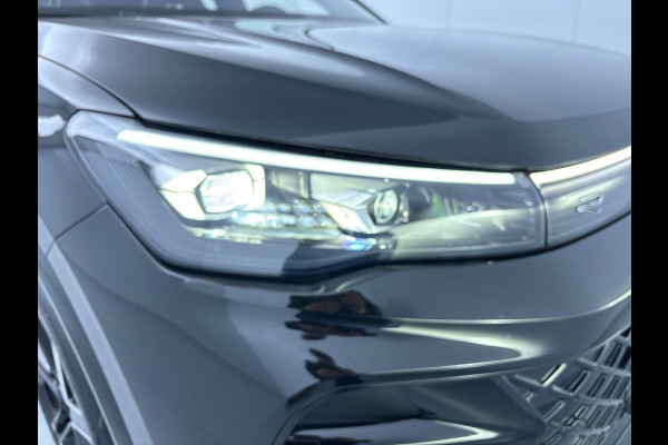 Volkswagen Tiguan 1.5 eHybrid R-Line Edition 272 pk Automaat (DSG) | Verlengde garantie | Navigatie | Panorama dak | Trekhaak (wegklapbaar) | Achteruitrijcamera (park assist) | Rondomzicht camera | Black-Style pakket | R-Line |