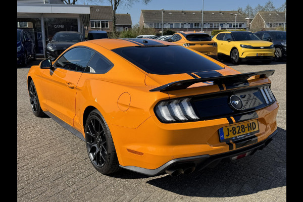 Ford Mustang Fastback 2.3 EcoBoost 289pk | Custom Pack Black | Lederen bekleding | Navigatie full map | Voorstoelen verwarmd en geventileerd | Audio installatie premium | Twister Orange