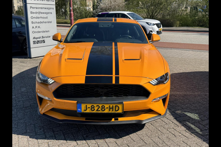 Ford Mustang Fastback 2.3 EcoBoost 289pk | Custom Pack Black | Lederen bekleding | Navigatie full map | Voorstoelen verwarmd en geventileerd | Audio installatie premium | Twister Orange